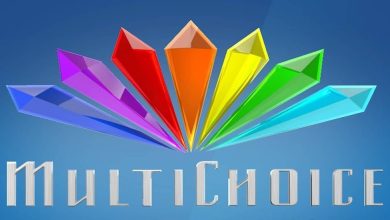 MultiChoice Group logo on rainbow background.