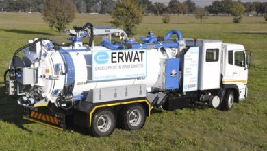 A white and blue truck equipped with a large hose, highlighting ERWAT's job openings for General Workers in Operations.
